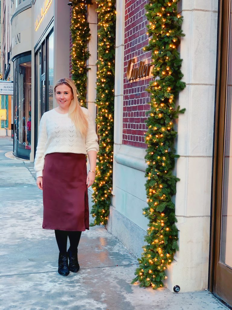 my holiday style is chunky sweaters, silky midi skirts, and classic gold jewelry